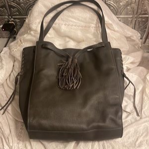 Lucky Brand khaki bag glove soft leather inside pockets outer slip pocket